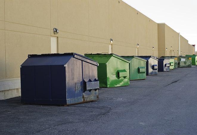 multiple dumpsters lining a construction site in Antioch